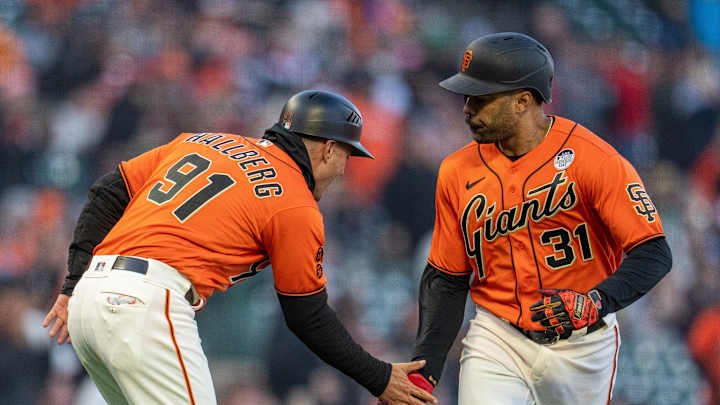Compare the Baltimore Orioles and the San Francisco Giants by looking at their player stats.